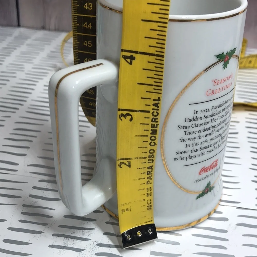 Ultímate source Christmas mug Coca Cola collectors